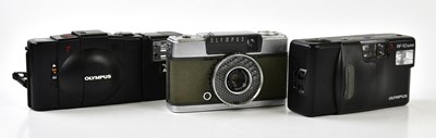 Lot 1392 - OLYMPUS; three Olympus 35mm film cameras, to...