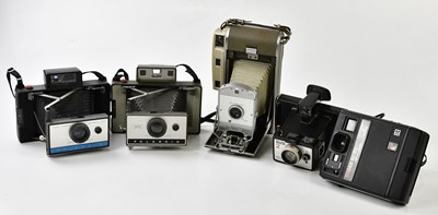 Lot 1433 - POLAROID; three Polaroid land cameras, to...