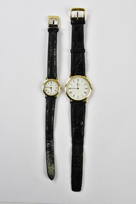 Lot 611 - OMEGA; a lady's and matching gentleman's...