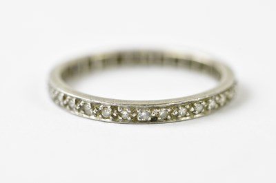 Lot 1152 - A white metal diamond set eternity ring, size...