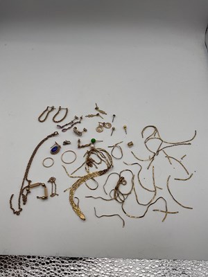 Lot 314 - A quantity of yellow 9ct gold and metal...
