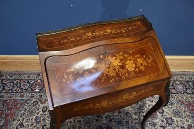 Lot 10 - A French inlaid kingwood and rosewood Louis XV...