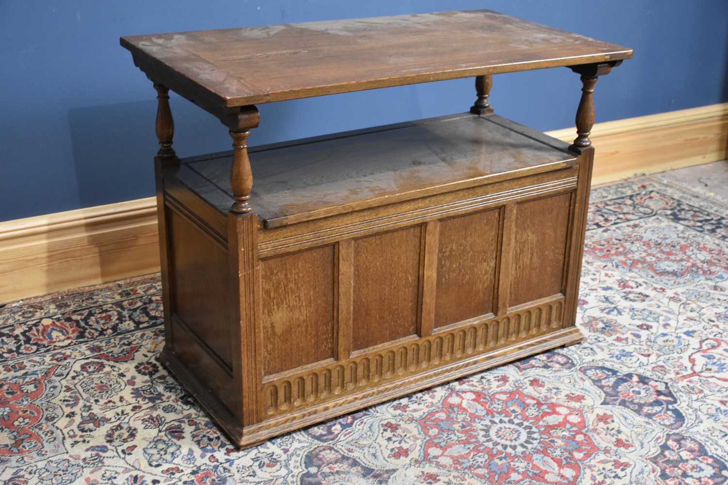 Lot 14 - A 1950s oak monk's bench with panelled front,...