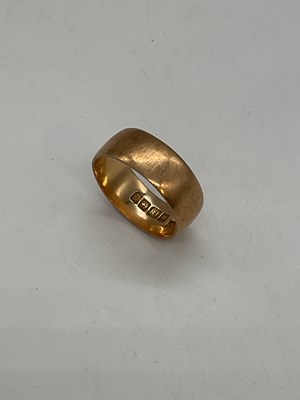 Lot 328 - An 18ct yellow gold wedding band, size N 1/2,...