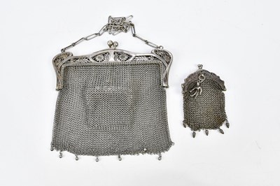 Lot 1051 - A white metal lady's mesh purse with...