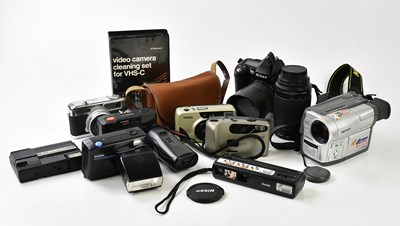 Lot 1403 - NIKON; an F80 camera, and assorted accessories,...