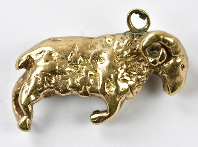 Lot 1163 - A 9ct yellow gold charm modelled as a ram,...
