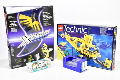 Lot 434 - A small collection of toys to include a Lego...