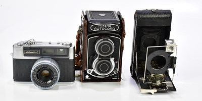 Lot 1413 - MINOLTA; an Autocord twin lens camera, Optiper-...