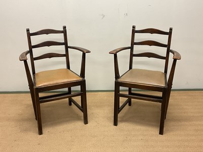 Lot 510 - ERCOL; a pair of early Ercol chairs.