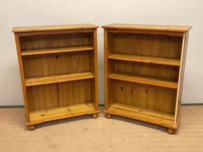 Lot 478 - A pair of pine bookcases, height 106cm, width...