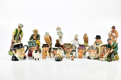 Lot 1239 - A collection of various ceramic figures, to...