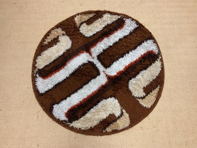 Lot 413 - A mid 20th century circular deep pile...