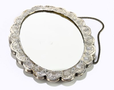 Lot 2328 - A Turkish white metal mounted hand mirror with...