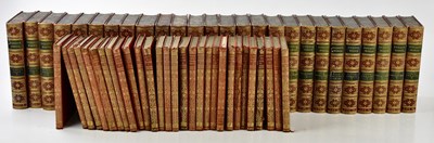 Lot 483 - Twenty-six leather bound volumes of Dickens'...