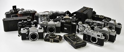 Lot 1453 - A collection of 35mm film cameras, to include...