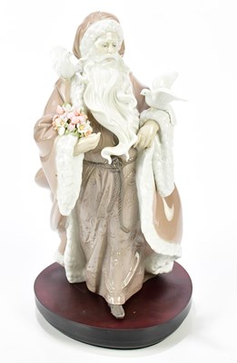 Lot 1236 - LLADRÓ; a large figure of Father Christmas,...