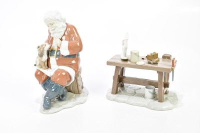 Lot 1243 - LLADRÓ; two boxed figures of Father Christmas...