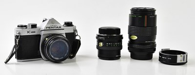 Lot 1444 - PENTAX; a Pentax K1000 35mm film camera,...
