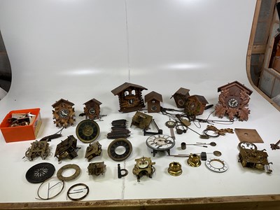 Lot 389 - A quantity of clock parts together with a...