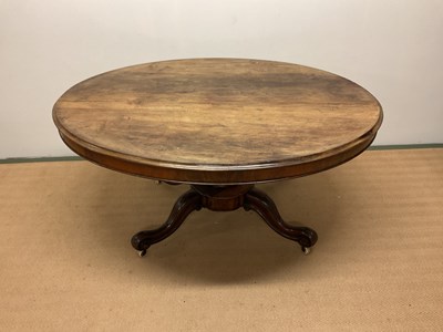 Lot 501 - An oval dining table, height 72cm, width 150cm,...