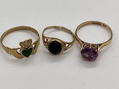 Lot 343 - Three 9ct yellow gold dress rings, one with...