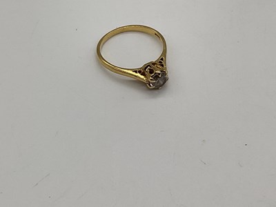 Lot 337 - An 18ct yellow gold solitaire diamond ring,...