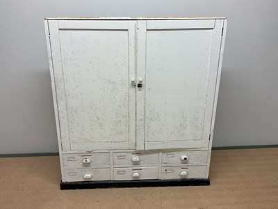 Lot 493 - A dental cabinet with six short drawers,...
