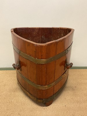 Lot 458 - An unusual teak and coopered triangular...