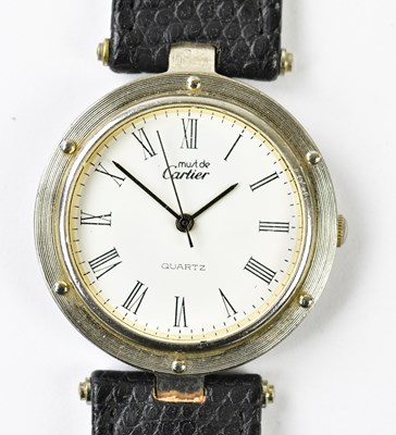 Lot 1219 - MUST DE CARTIER; a gentleman's silver cased...