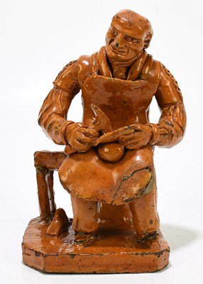 Lot 592 - A mid-19th century Welsh glazed Redware figure...