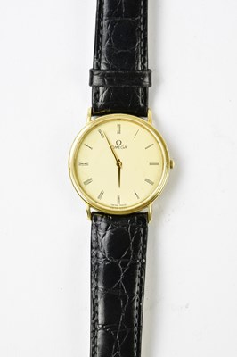 Lot 1210 - OMEGA; a gentleman's 9ct gold cased quartz...