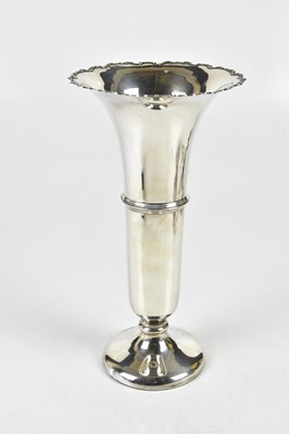 Lot 2101 - A George V hallmarked silver trumpet vase of...