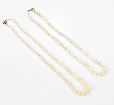 Lot 515 - Two strings of graduated vintage cultured pearls.