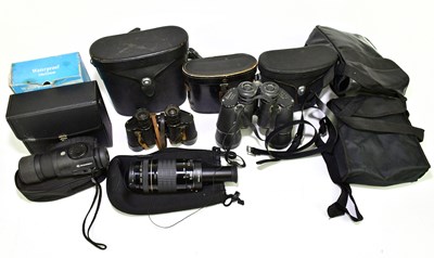 Lot 1133 - A collection of vintage and modern binoculars,...