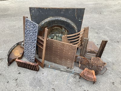 Lot 1222 - A cast iron fireplace insert, together with...