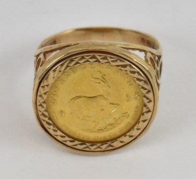 Lot 791 - A 1983 1/10 ounce Krugerrand in 9ct yellow...