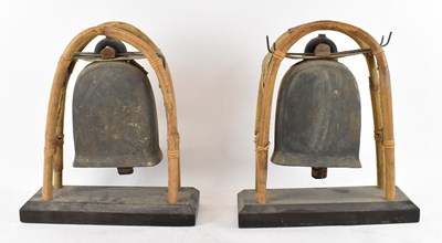 Lot 558 - A pair of cast metal and bamboo supported...