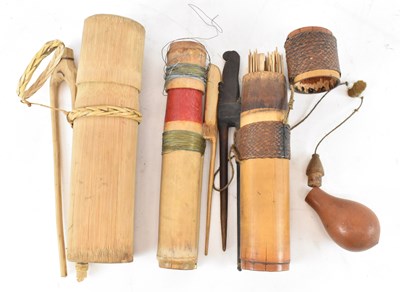 Lot 580 - A group of three tribal bamboo dart/arrow...
