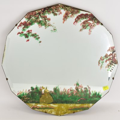Lot 60 - An early 20th century wall mirror with hand...