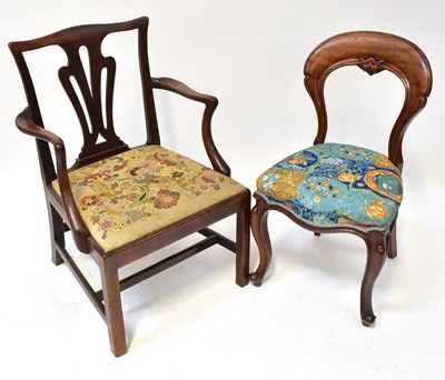 Lot 11 - A Georgian mahogany open arm elbow chair, with...