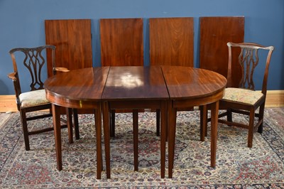 Lot 5 - A Georgian mahogany D-end dining table with...