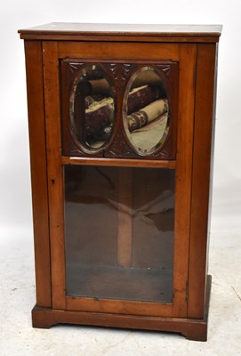 Lot 1551 - A Victorian walnut cabinet with glazed door,...