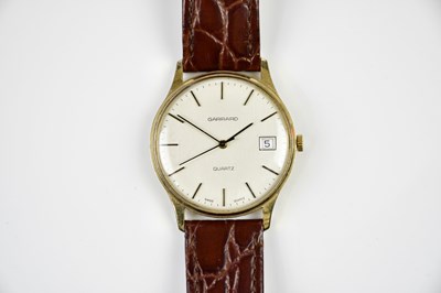 Lot 613 - GARRARD, a gentleman’s 9ct gold wristwatch,...