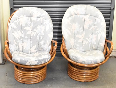 Lot 29 - A pair of modern revolving bamboo conservatory...