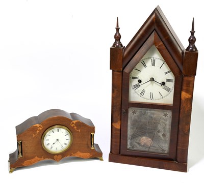 Lot 1379 - An Edwardian inlaid mahogany mantel clock of...