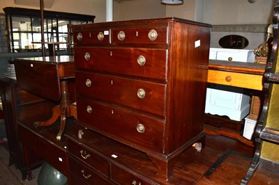 Lot 1247 - An early 19th century mahogany chest of two...
