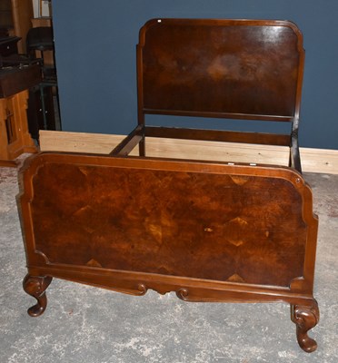 Lot 1554 - A 1920s walnut small size double bed, the...