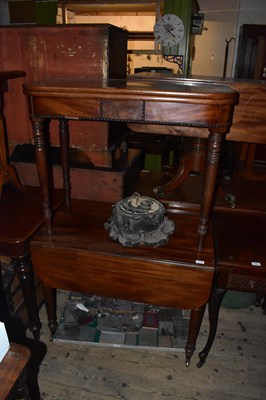 Lot 1334 - A 19th century mahogany fold-over tea table on...
