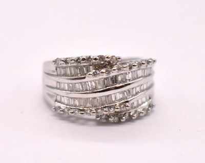 Lot 1105 - A 14ct white gold diamond cluster ring, set...